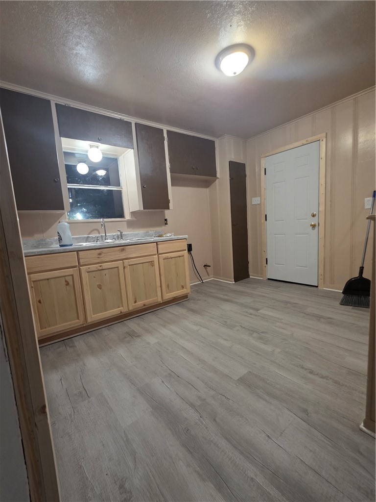 408 North Live Oak Street Mathis, TX 78368 - Photo 5 of 7 a large kitchen with a sink and dishwasher in it