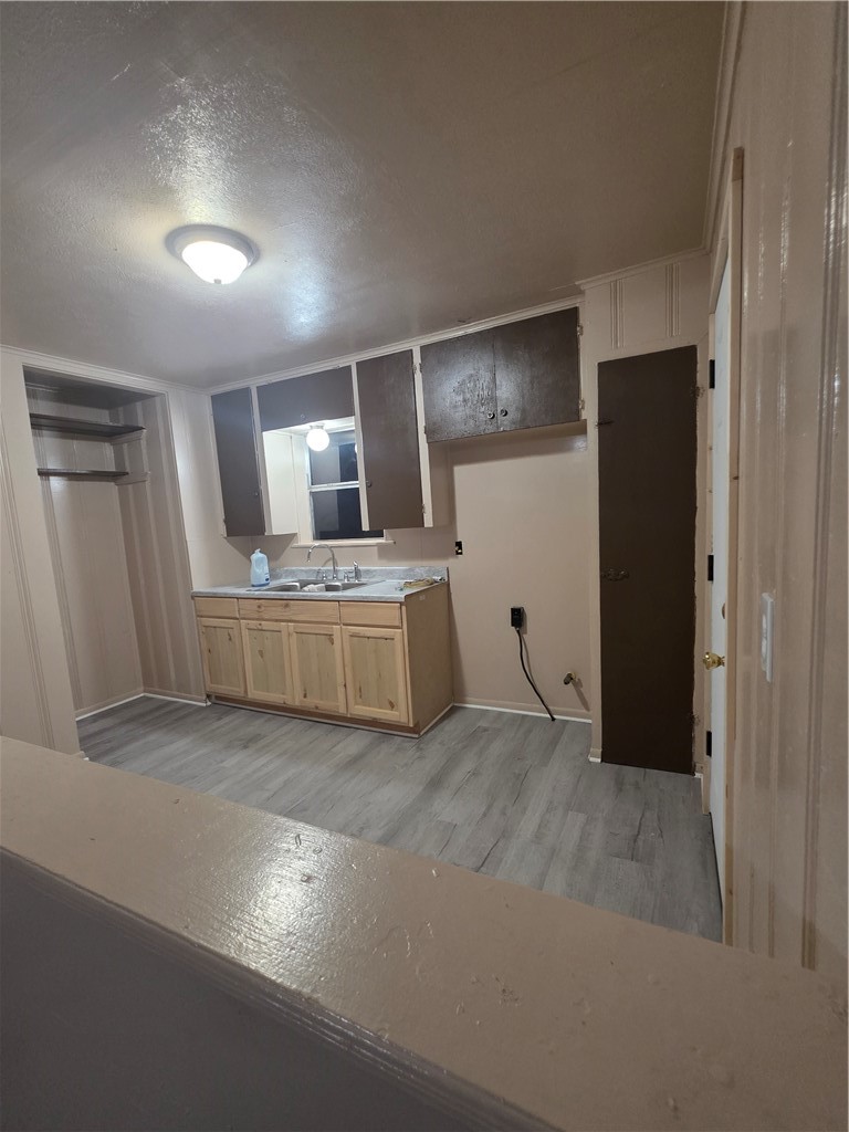 408 North Live Oak Street Mathis, TX 78368 - Photo 6 of 7 a view of a kitchen with a sink and cabinet
