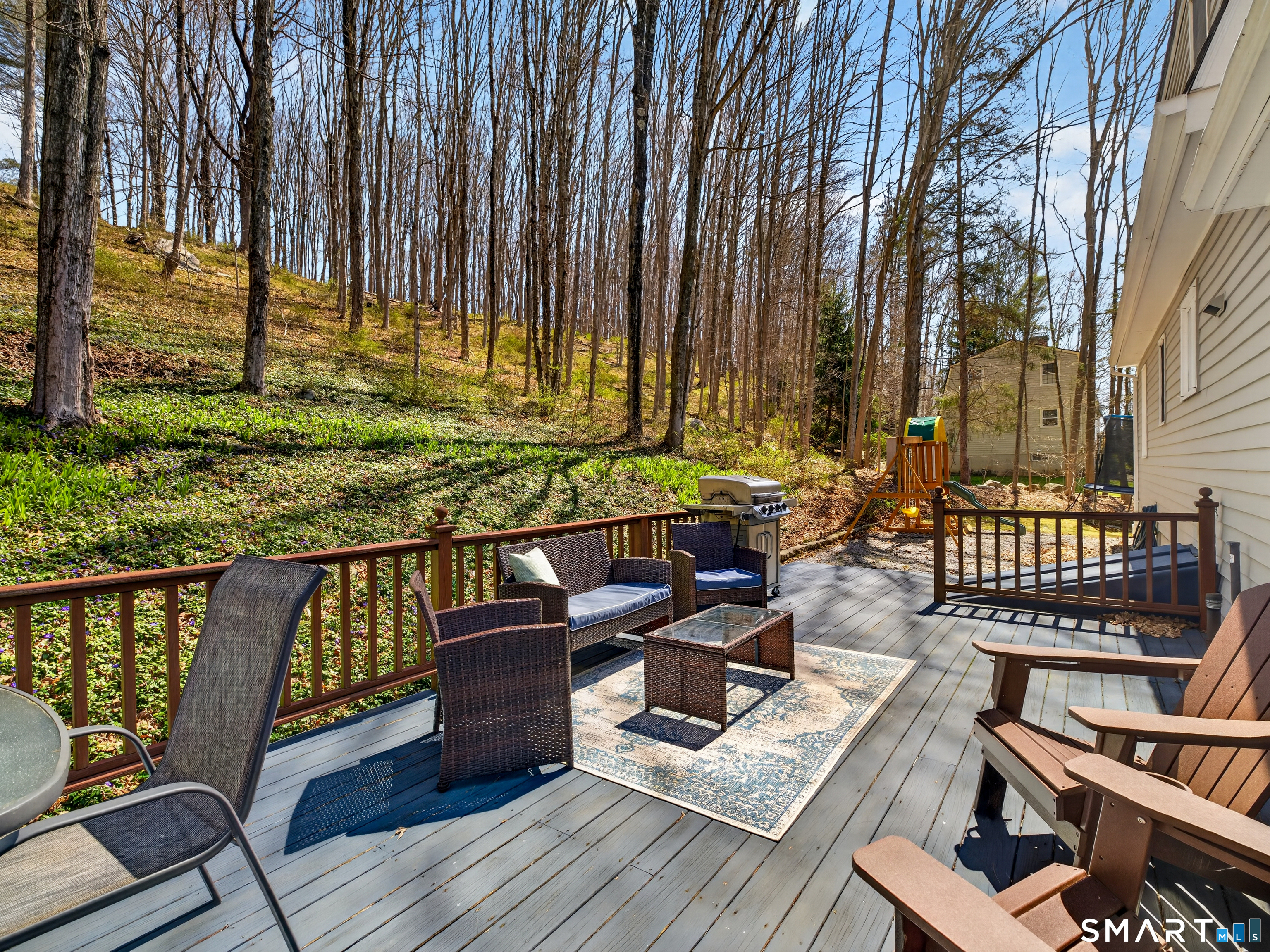 599 Durham Road Guilford, CT 06437 - Photo 35 of 42 a view of a balcony with two chairs and a table