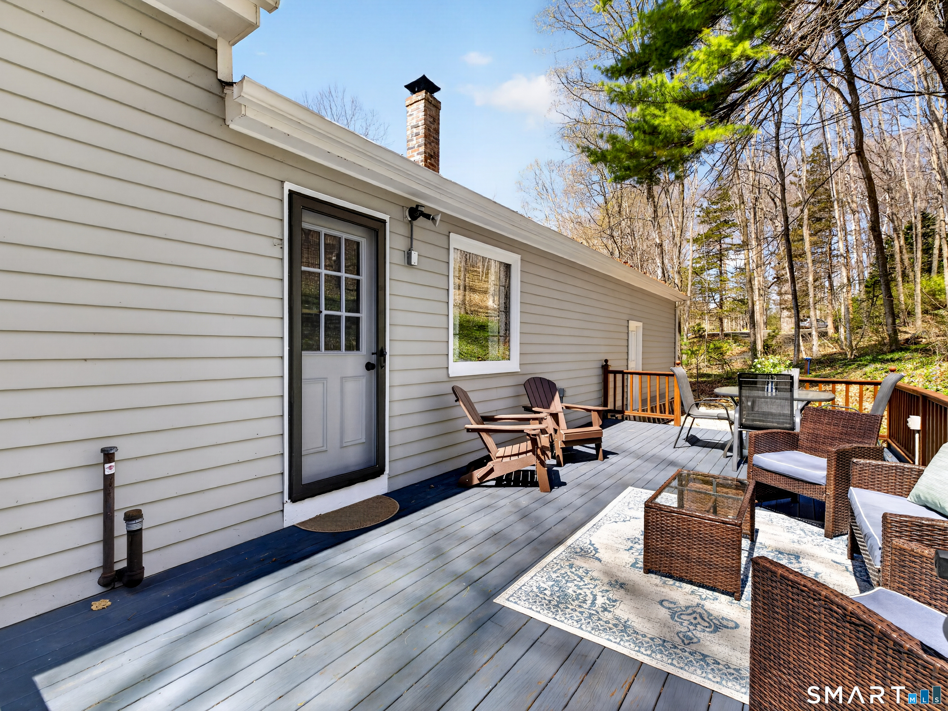 599 Durham Road Guilford, CT 06437 - Photo 36 of 42 a view of a patio with couches and potted plants