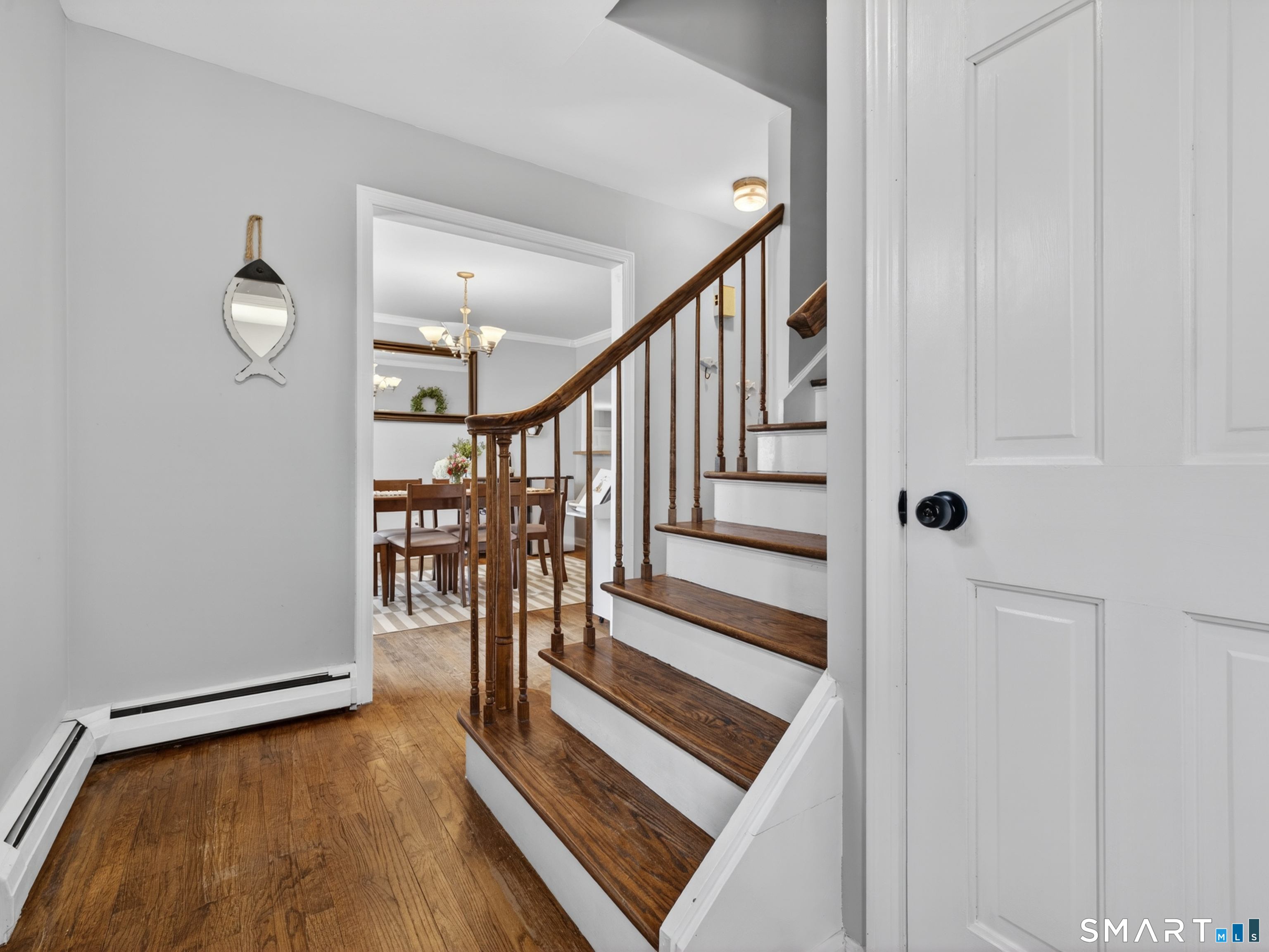 599 Durham Road Guilford, CT 06437 - Photo 7 of 42 a view of entryway and hall with wooden floor