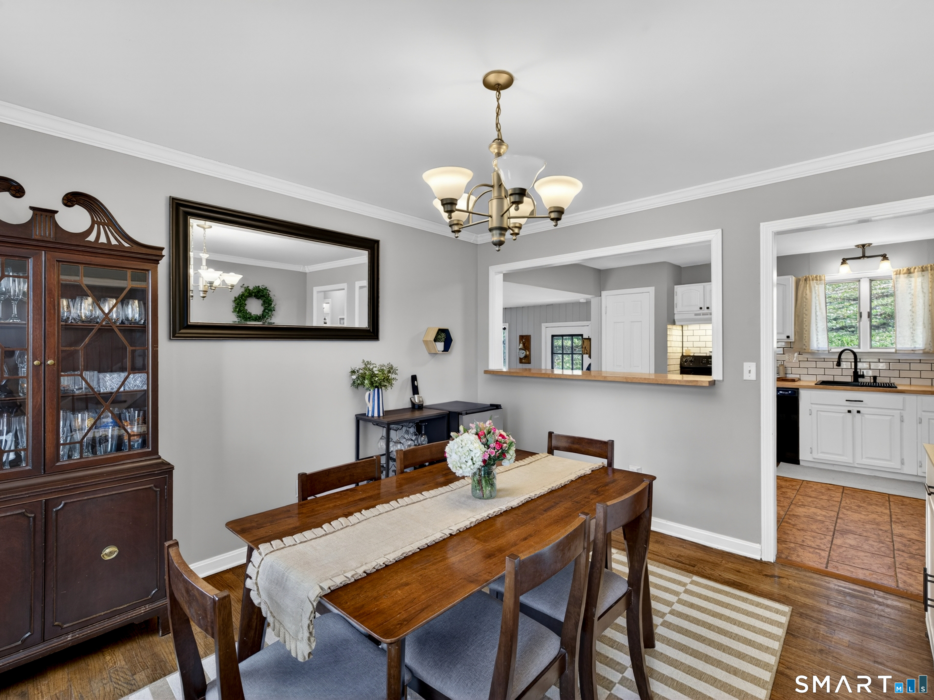 599 Durham Road Guilford, CT 06437 - Photo 8 of 42 a view of a dining room with furniture and wooden floor
