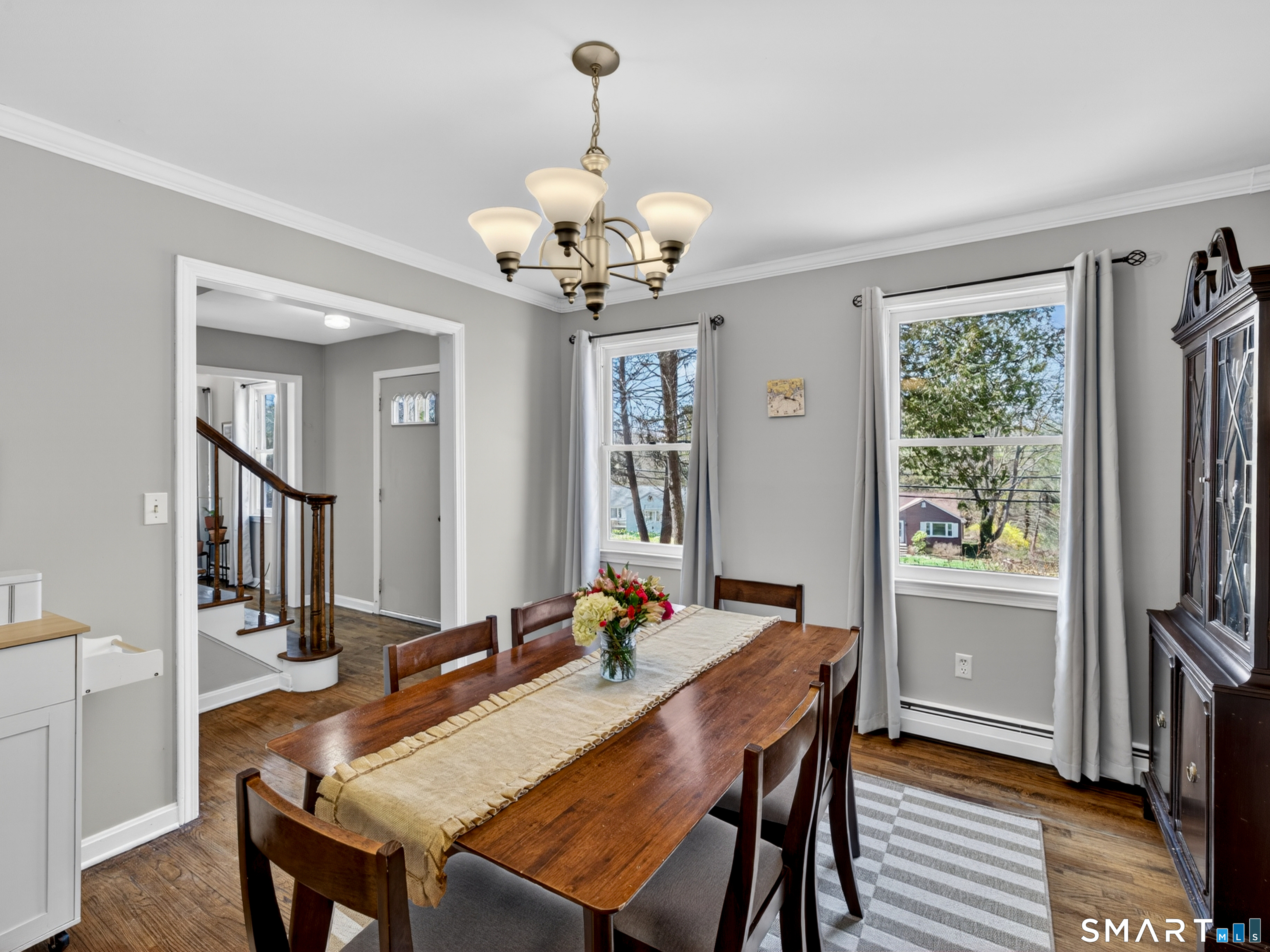 599 Durham Road Guilford, CT 06437 - Photo 9 of 42 a view of a dining room with furniture window and wooden floor