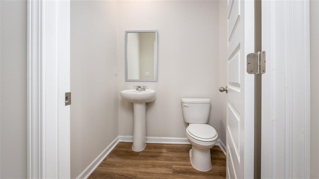2291 Edgecombe Lane Dacula, GA 30019 - Photo 15 of 42 a bathroom with a toilet and a sink