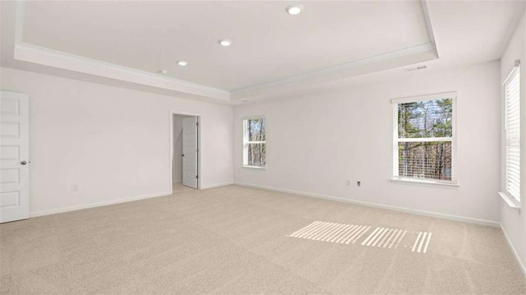 2291 Edgecombe Lane Dacula, GA 30019 - Photo 20 of 42 an empty room with windows