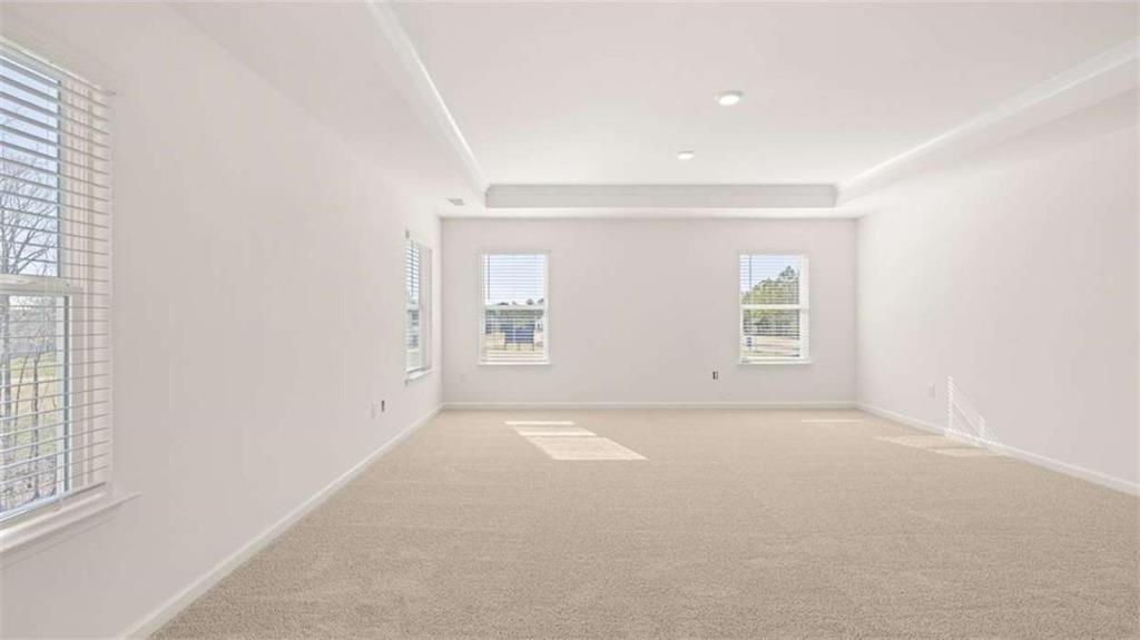 2291 Edgecombe Lane Dacula, GA 30019 - Photo 22 of 42 an empty room with windows
