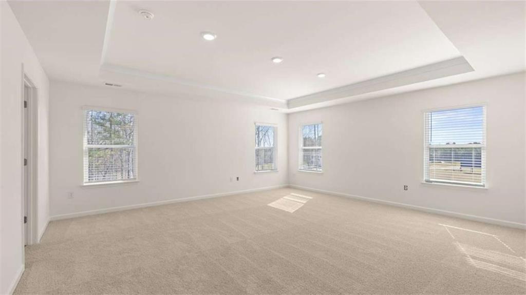 2291 Edgecombe Lane Dacula, GA 30019 - Photo 23 of 42 an empty room with windows