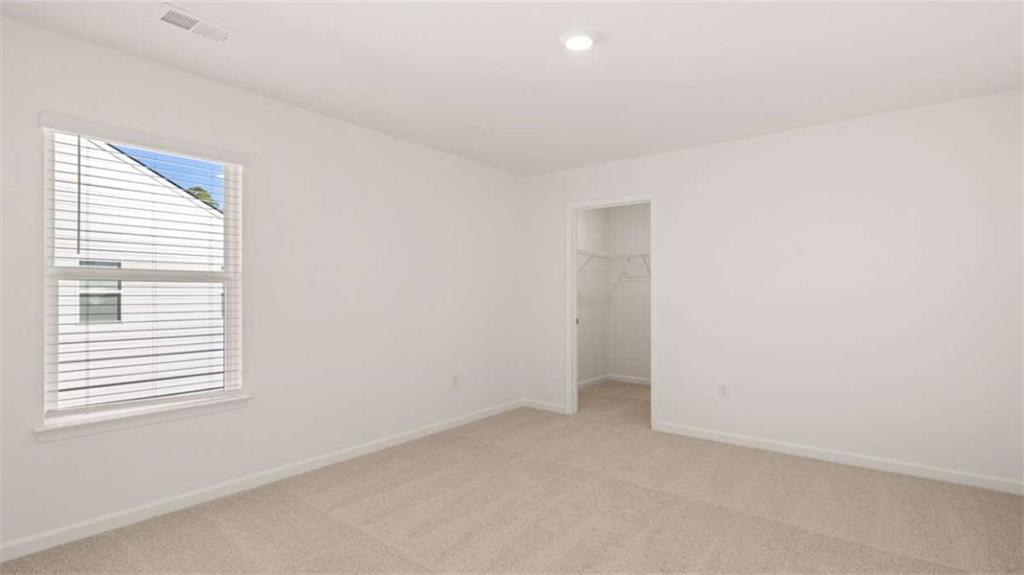 2291 Edgecombe Lane Dacula, GA 30019 - Photo 31 of 42 an empty room with a window