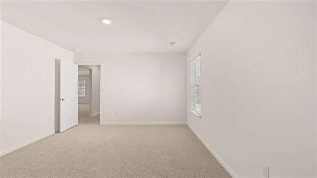 2291 Edgecombe Lane Dacula, GA 30019 - Photo 32 of 42 a view of an empty room