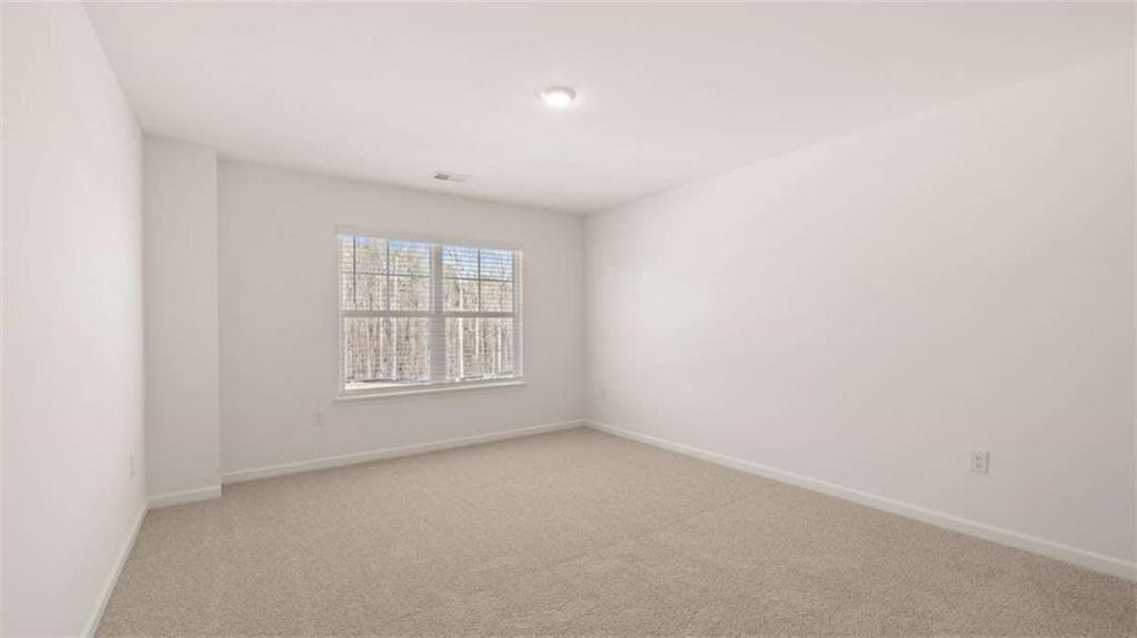 2291 Edgecombe Lane Dacula, GA 30019 - Photo 33 of 42 an empty room with a window