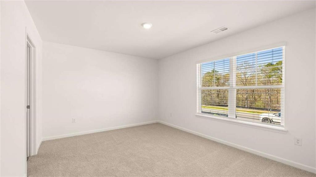 2291 Edgecombe Lane Dacula, GA 30019 - Photo 35 of 42 an empty room with a window