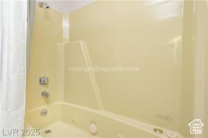 223 Hunter Road, Unit B303 Brian Head, UT 84719 - Photo 14 of 49 Full bathroom with shower / bath combo with shower curtain