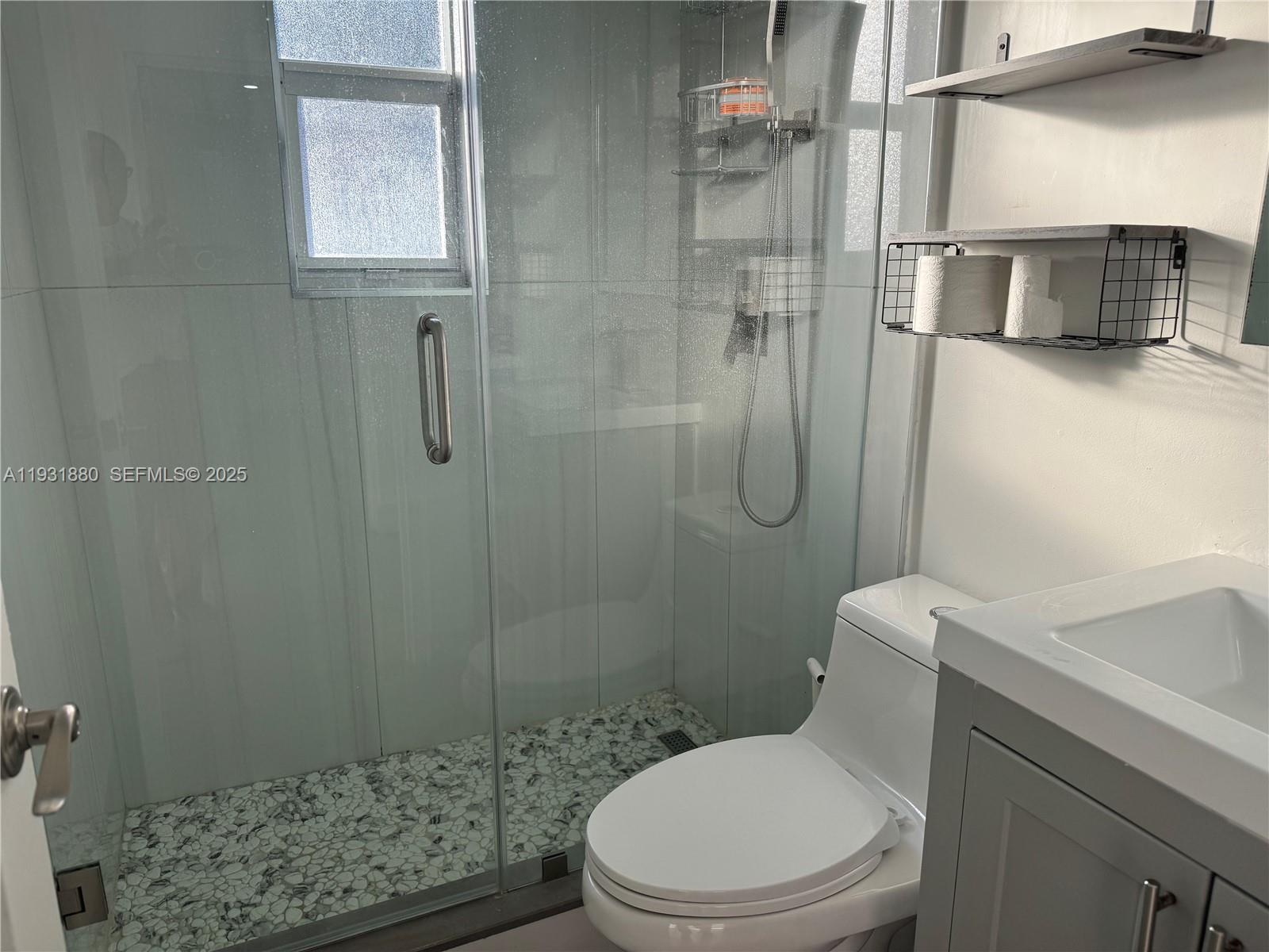 731 East 19th Street Hialeah, FL 33013 - Photo 5 of 17 a white toilet sitting next to a shower