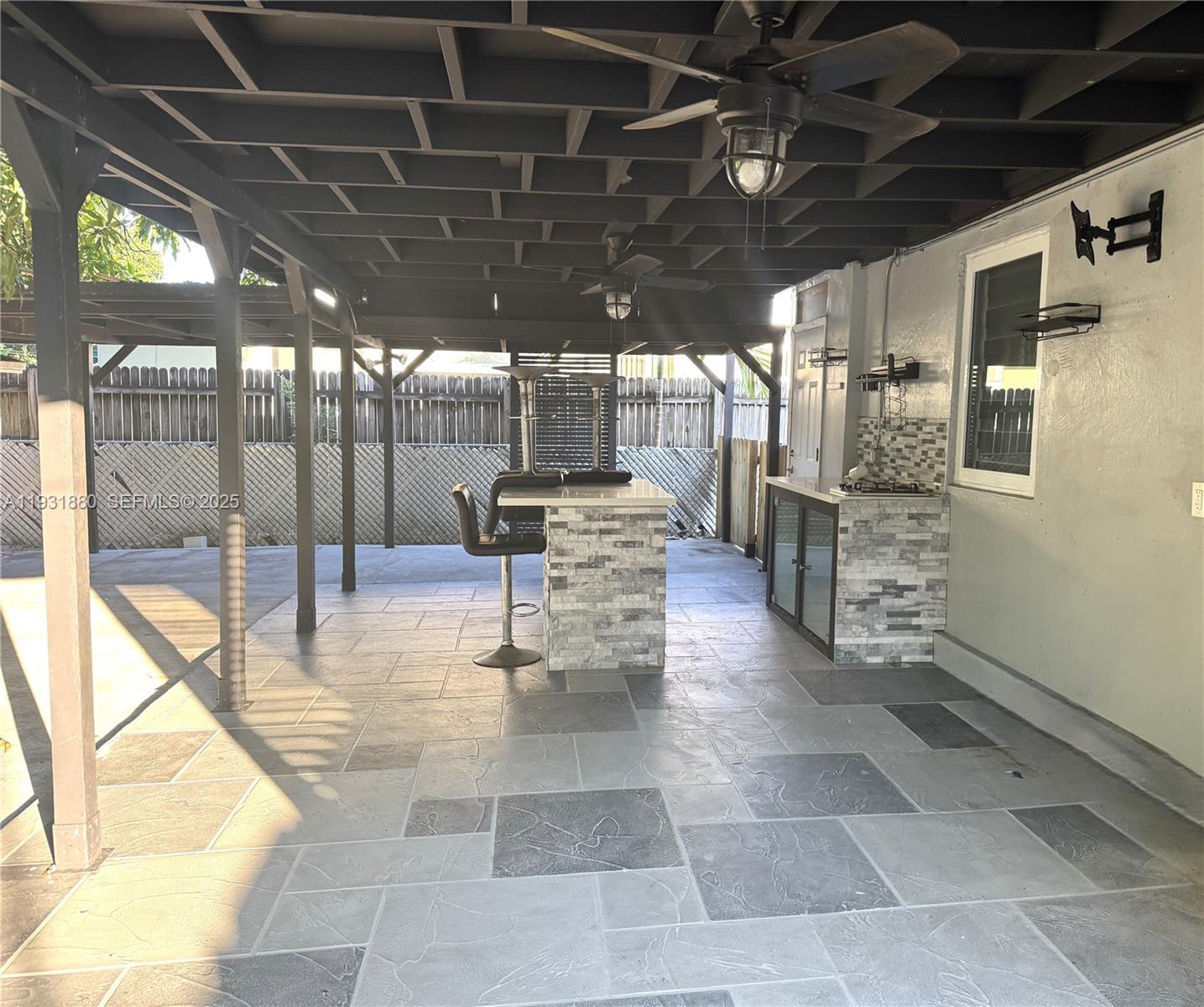 731 East 19th Street Hialeah, FL 33013 - Photo 9 of 17 a view of a hall with wooden floor