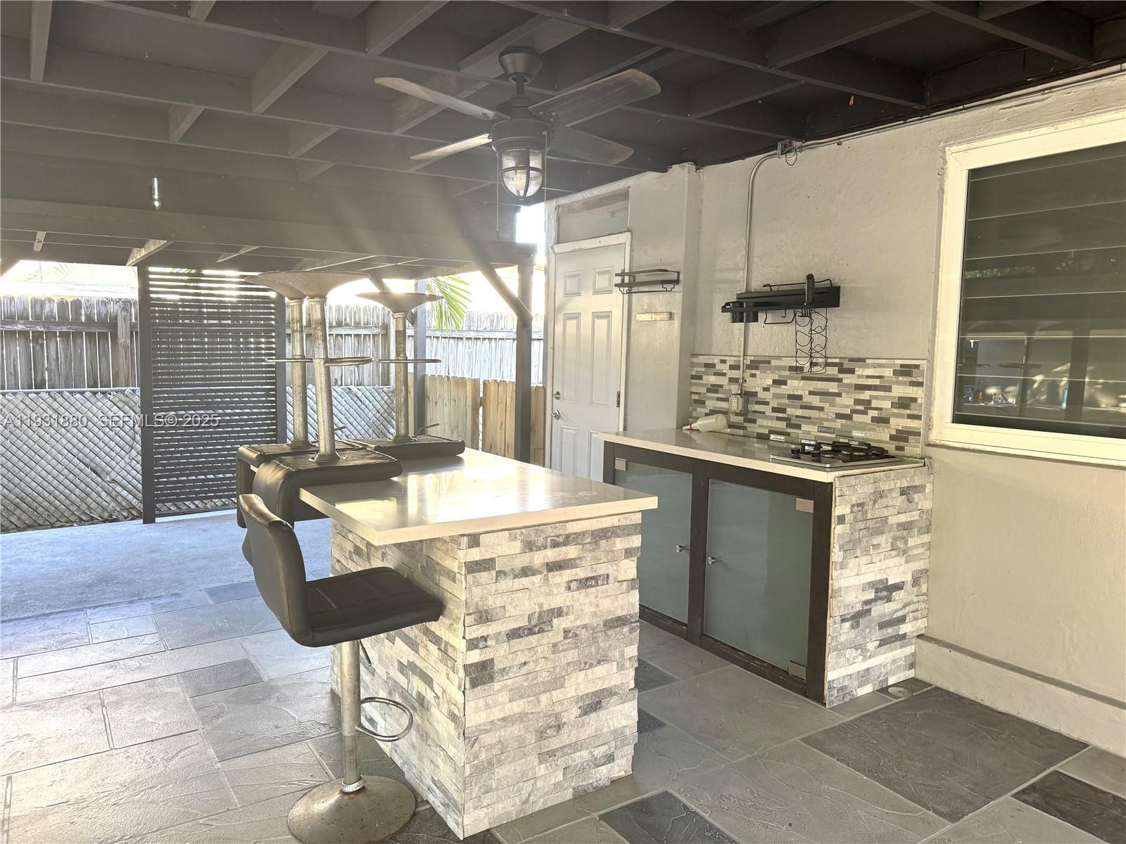 731 East 19th Street Hialeah, FL 33013 - Photo 10 of 17 a view of a chairs and table in a patio