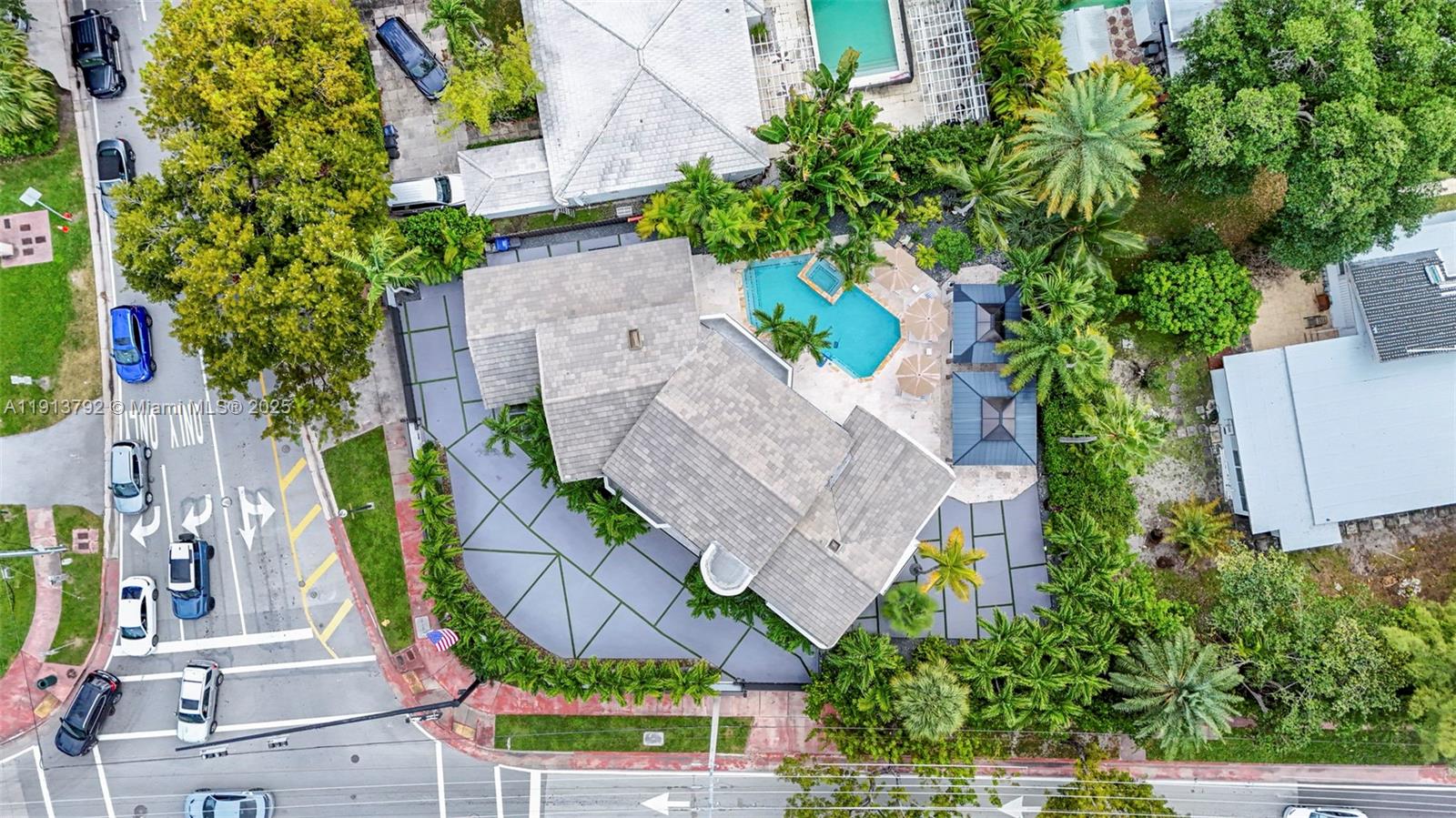6180 Pine Tree Drive Miami Beach, FL 33140 - Photo 98 of 100 an aerial view of residential house with outdoor space and swimming pool
