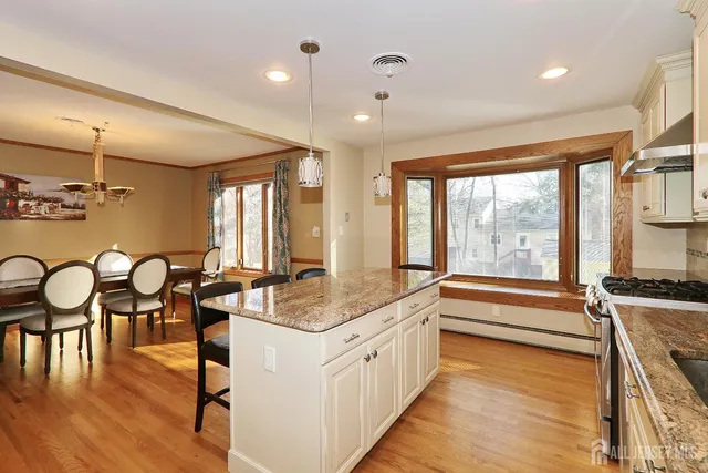 a very nice looking kitchen with a large window