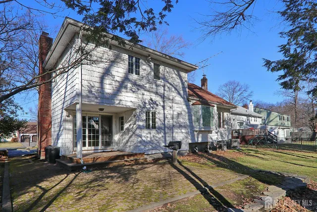 a view of a building with a yard