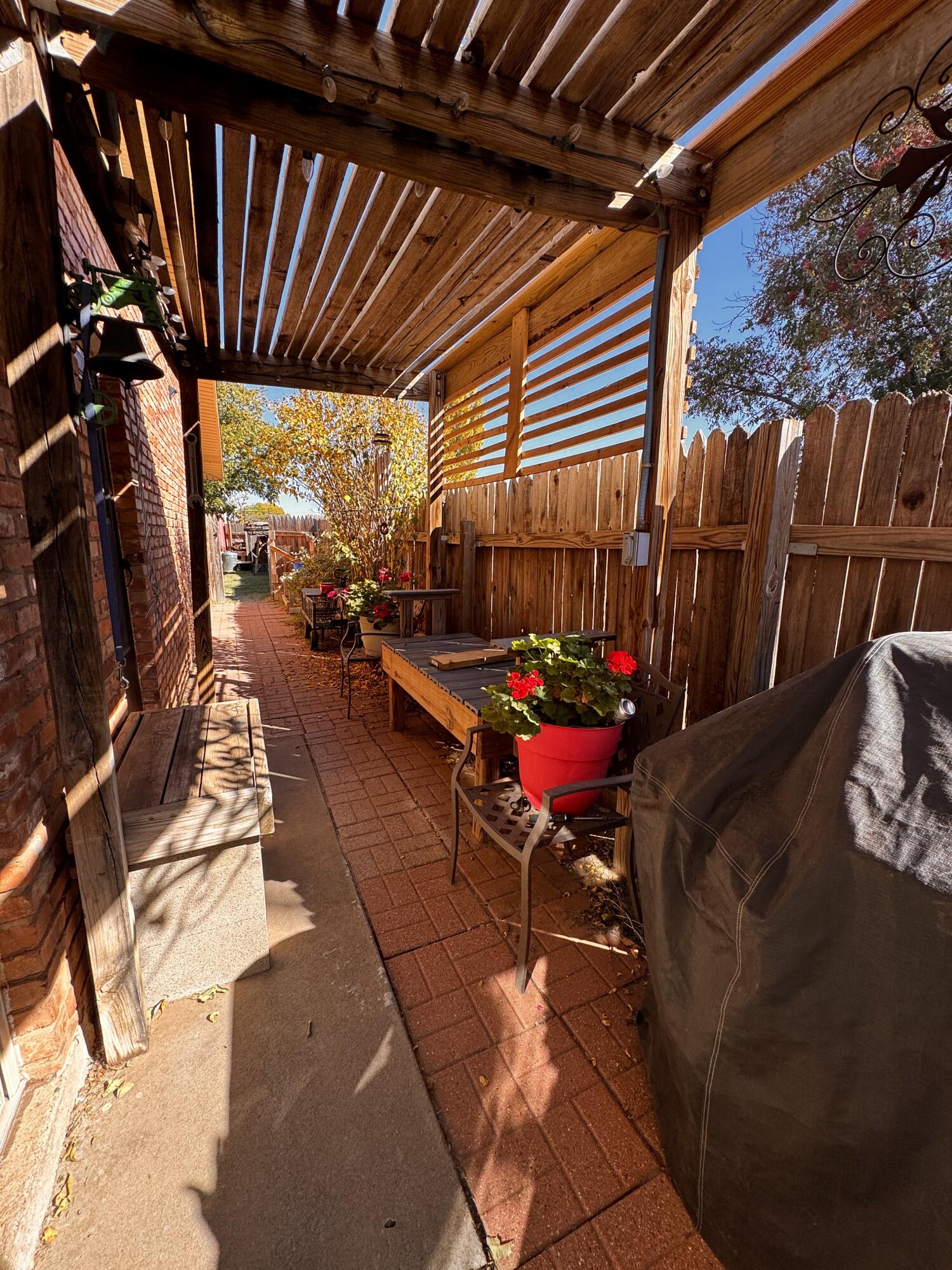 3902 Sides Street Plainview, TX 79072 - Photo 19 of 26 a view of a backyard with sitting area