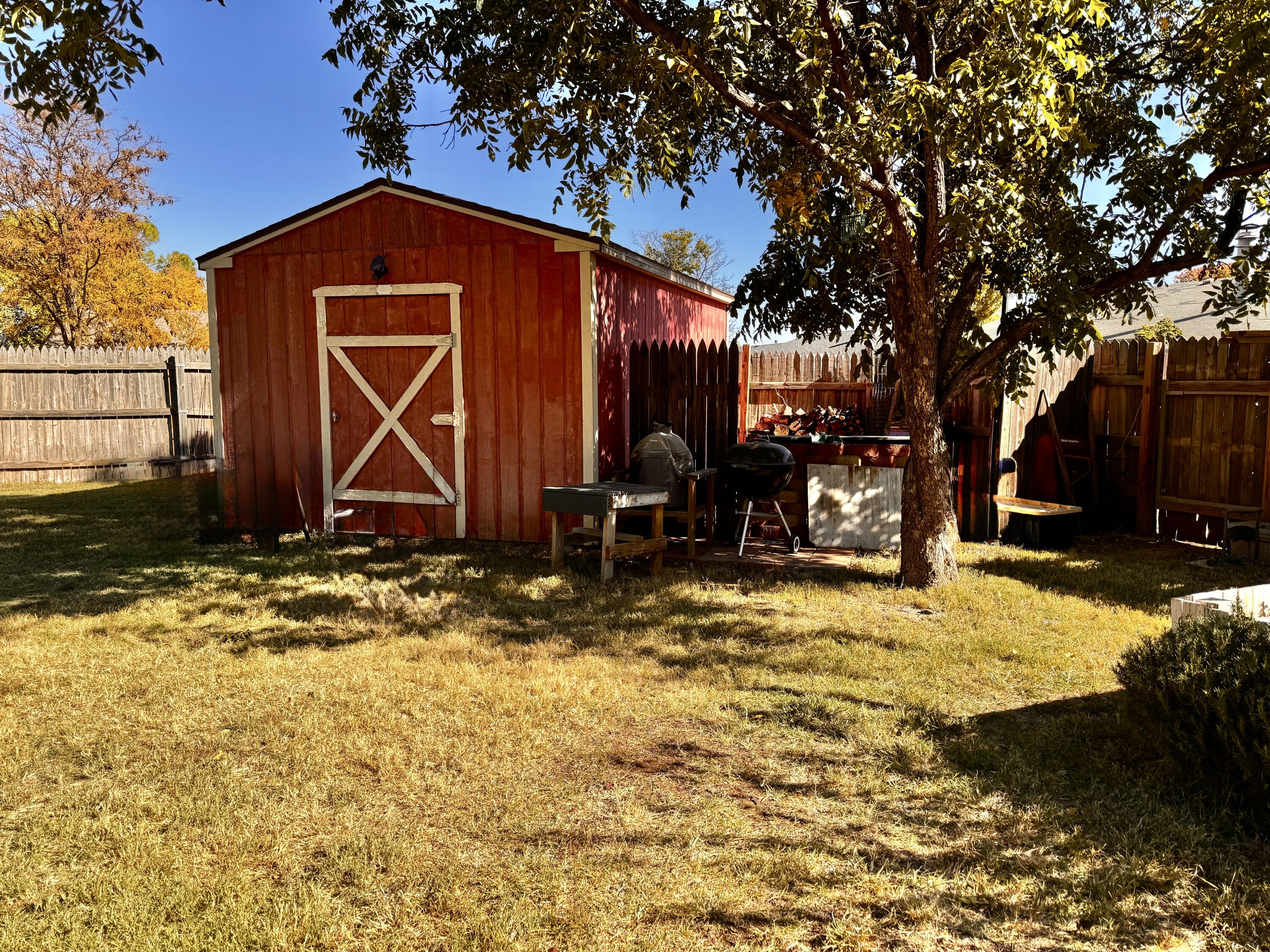 3902 Sides Street Plainview, TX 79072 - Photo 24 of 26 a front view of a house with a yard