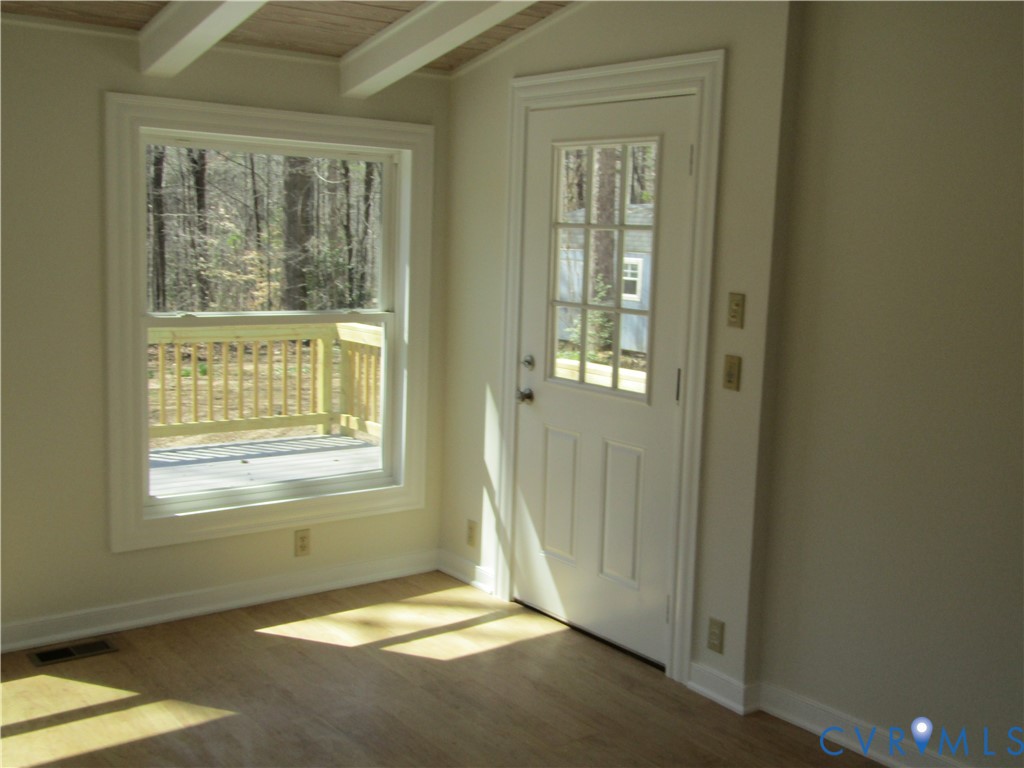 5705 Community House Road Columbia, VA 23038 - Photo 18 of 23 a view of an empty room with a window