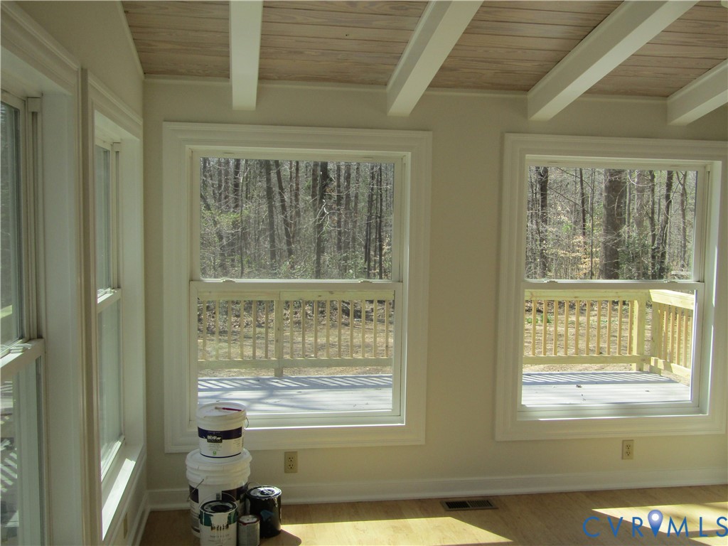 5705 Community House Road Columbia, VA 23038 - Photo 19 of 23 a view of an empty room with a window