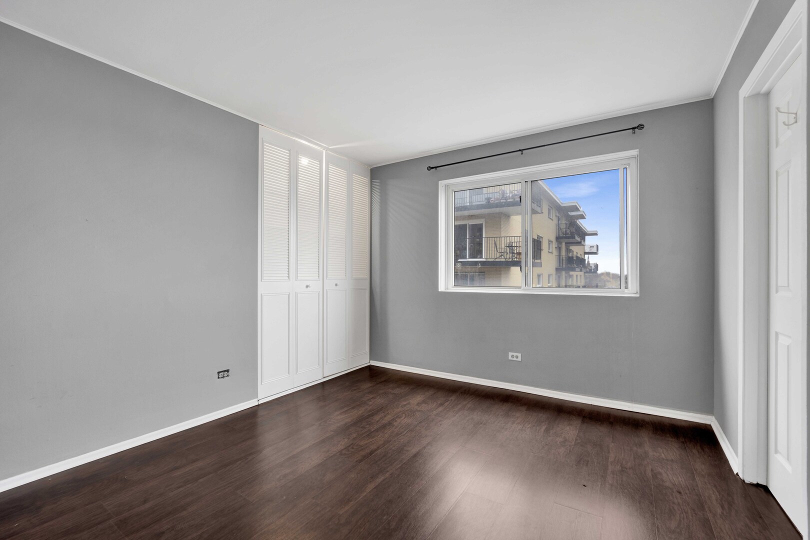 314 Lathrop Avenue, Unit 407 Forest Park, IL 60130 - Photo 23 of 27 a view of room with wooden floor and window