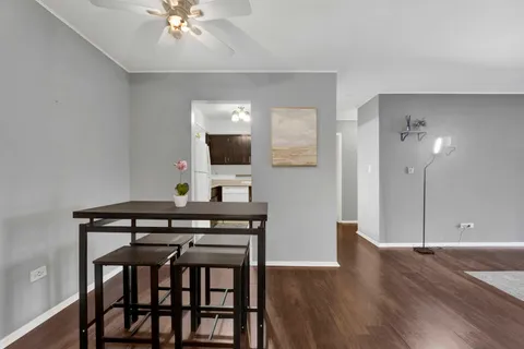 a view of a livingroom with furniture and wooden floor