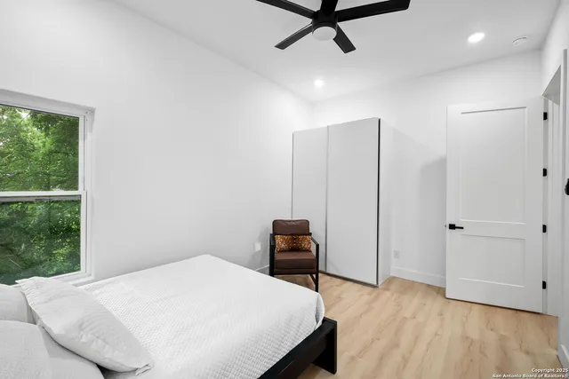 a balcony with table and chairs