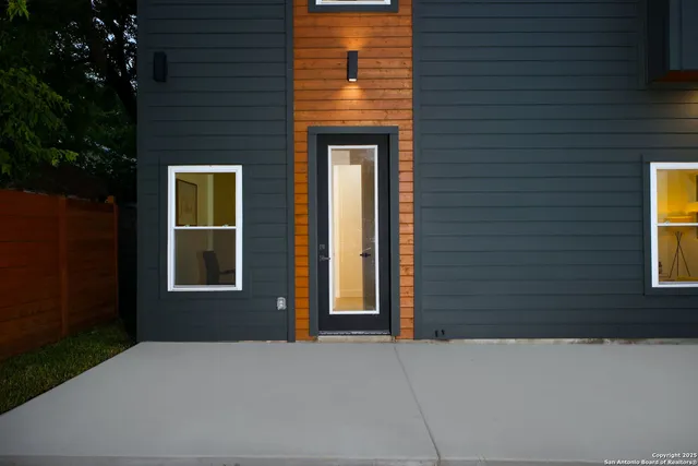 a view of a hallway with the wooden floor
