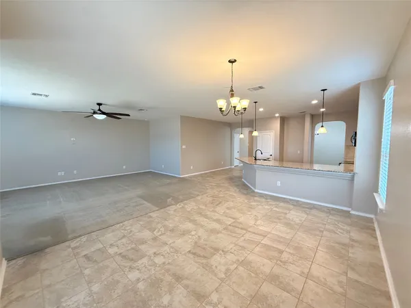 a view of a kitchen with a sink