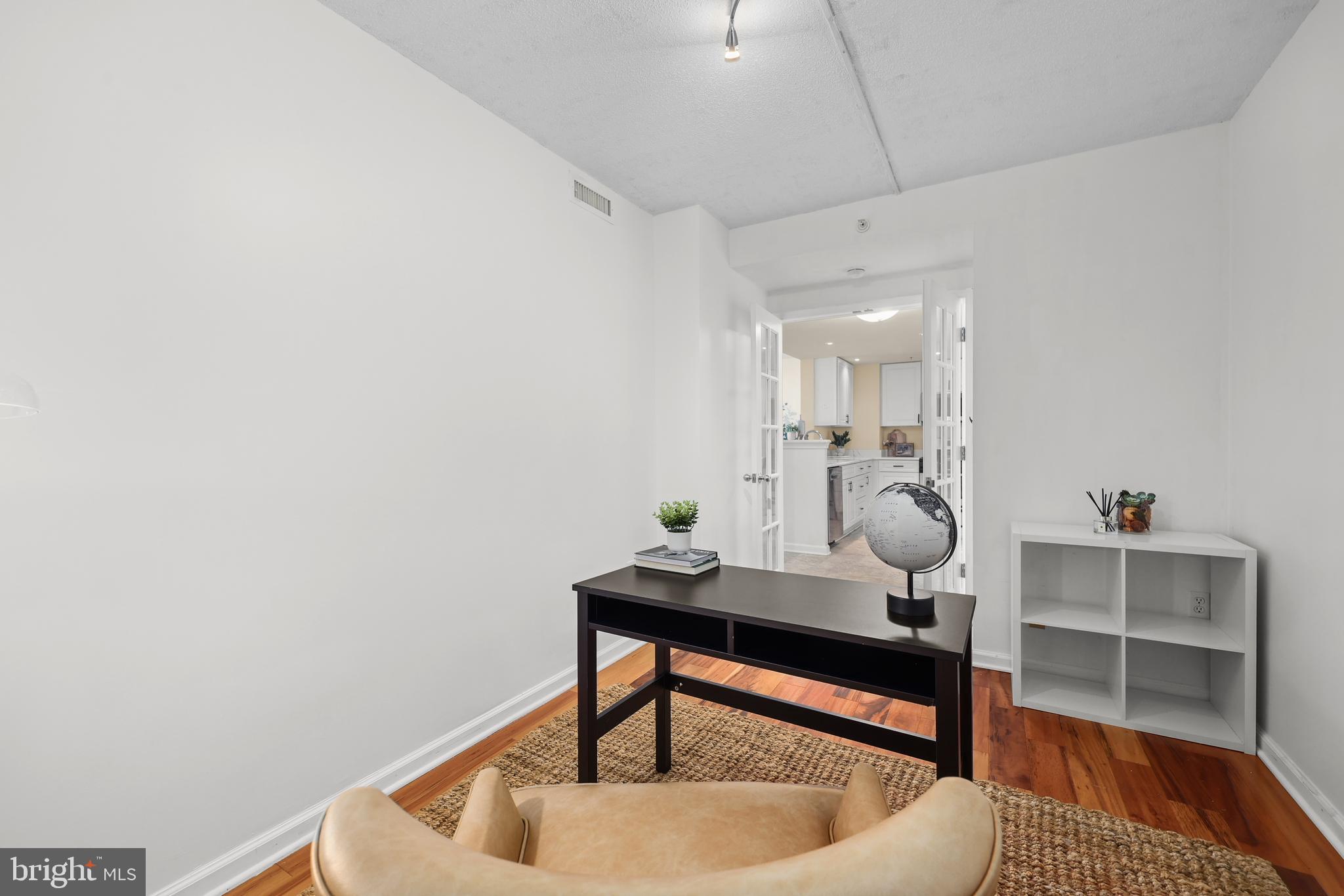 2726 Gallows Road, Unit 1004 Vienna, VA 22180 - Photo 11 of 26 Huge den with Brazilian cherry floors