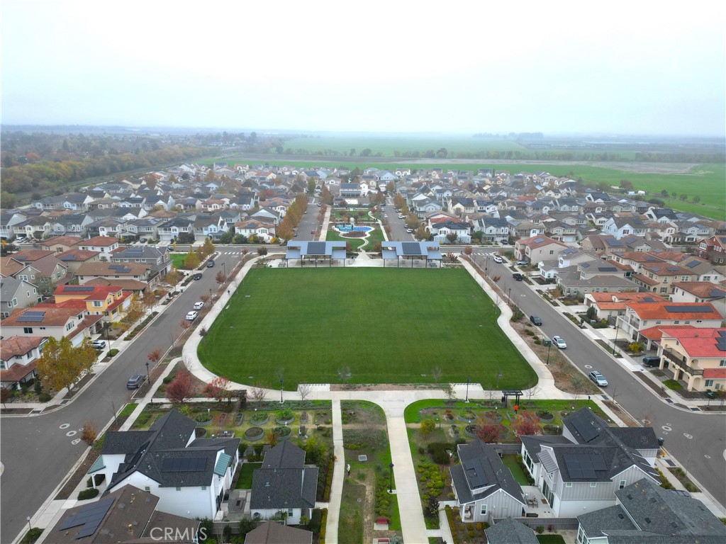 1661 Spring Street, Unit 444 Davis, CA 95616 - Photo 10 of 16 an aerial view of residential houses with outdoor space