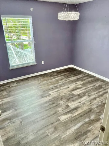 a view of a room that has a window in it