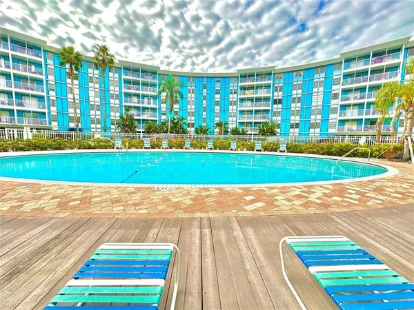 a view of a big room with a big yard and plants