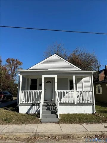 a front view of a house with garage