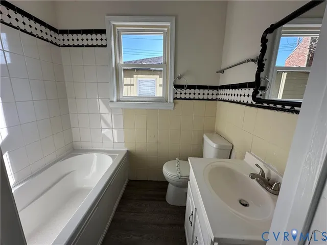 a bathroom with a sink and a bathtub