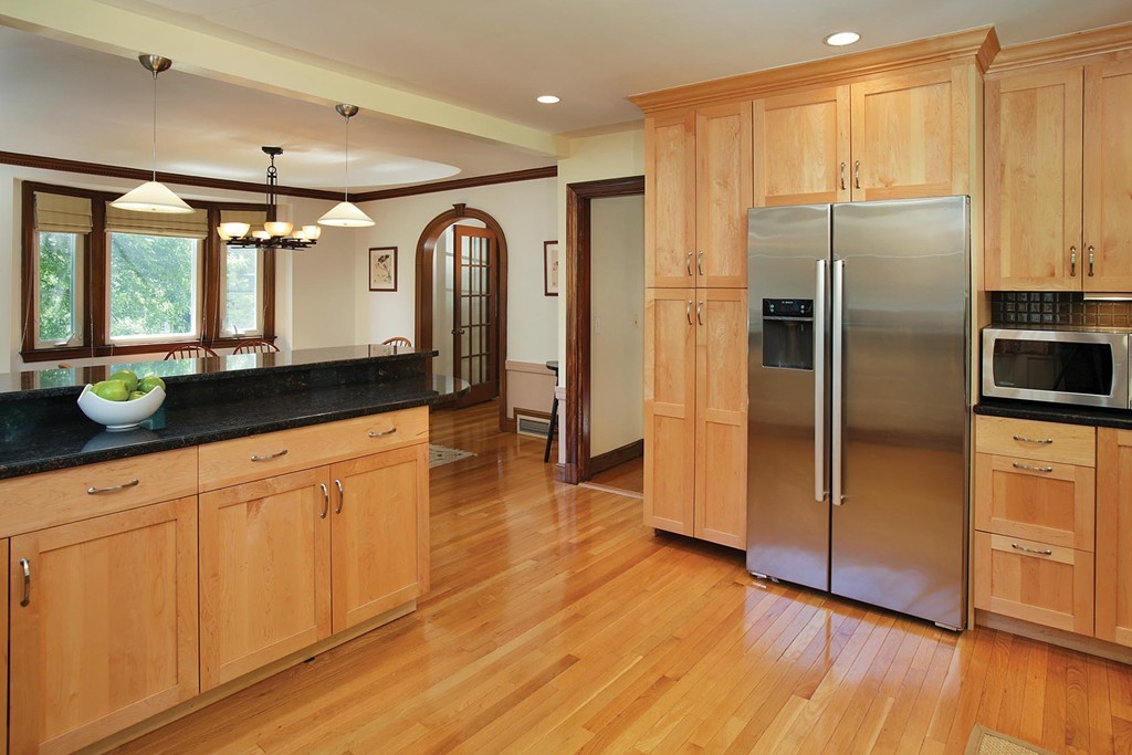 55 Welland Road Brookline, MA 02445 - Photo 6 of 9 a kitchen with stainless steel appliances granite countertop a refrigerator and a sink