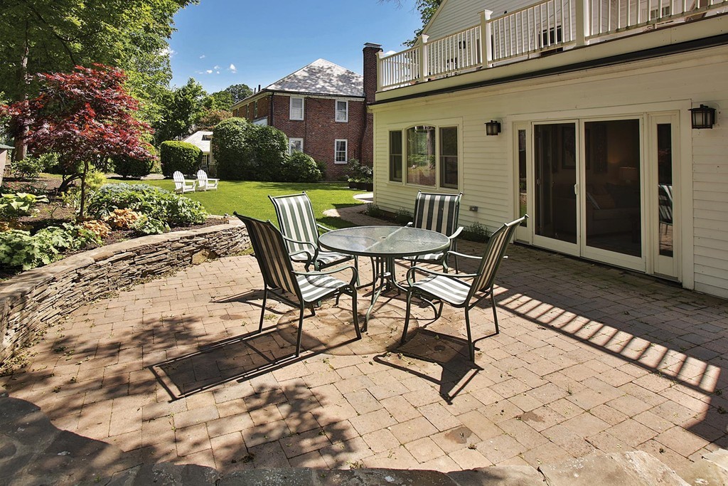 55 Welland Road Brookline, MA 02445 - Photo 8 of 9 a view of a house with backyard and sitting area
