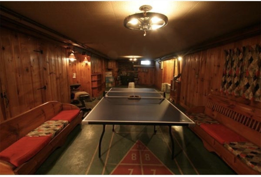 211 Russell Street Hadley, MA 01035 - Photo 20 of 20 a room with pool table and chandelier