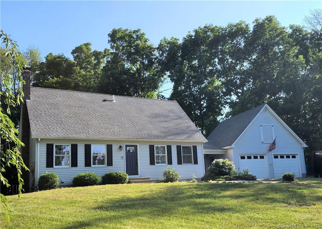 Nestled in 4.9 Acres of Privacy
