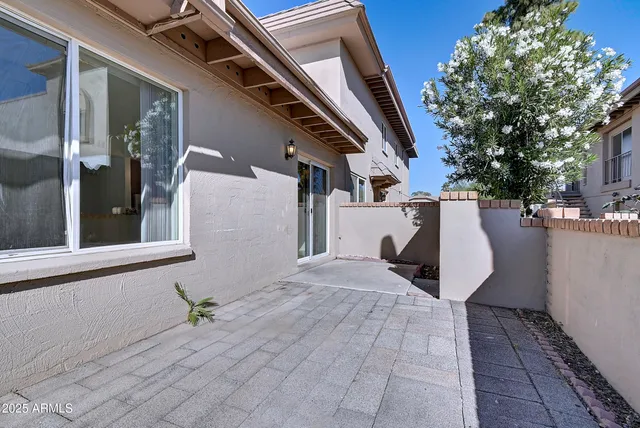 a view of a house with a patio