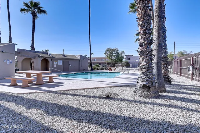a house view with a sitting space and garden space