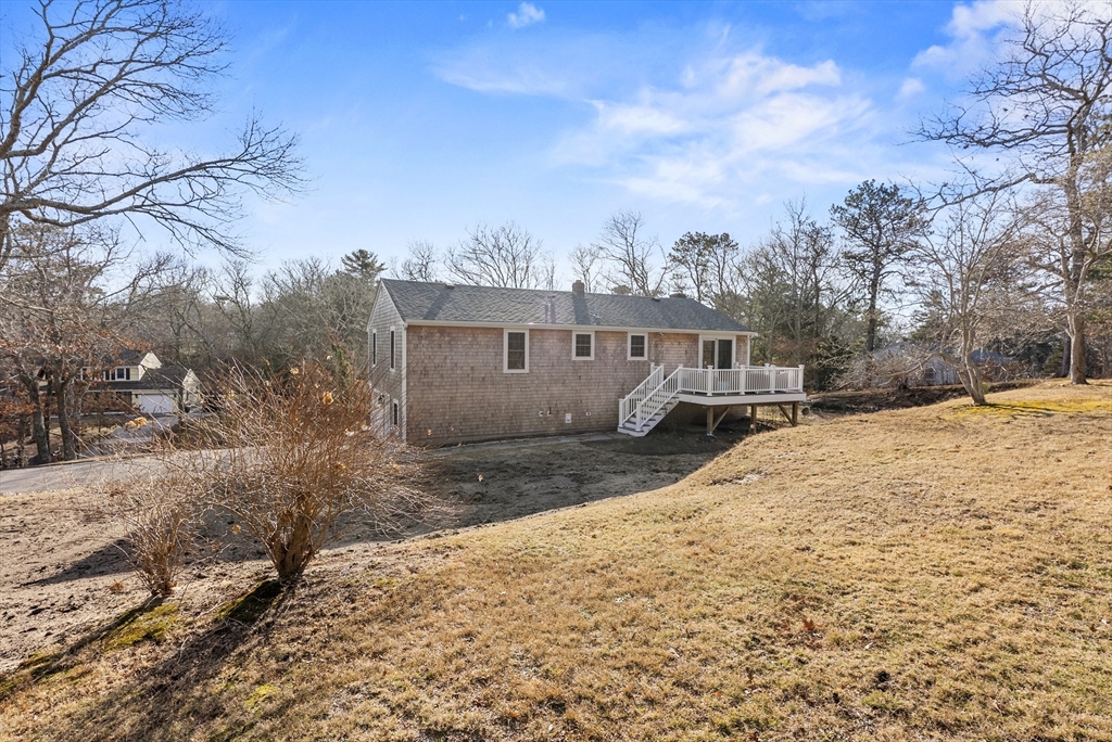30 Pawtuxet Road Plymouth, MA 02360 - Photo 14 of 42 a view of a house with a yard covered in snow