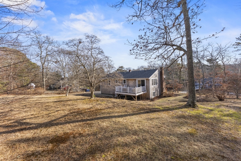 30 Pawtuxet Road Plymouth, MA 02360 - Photo 16 of 42 a view of a yard with a large tree