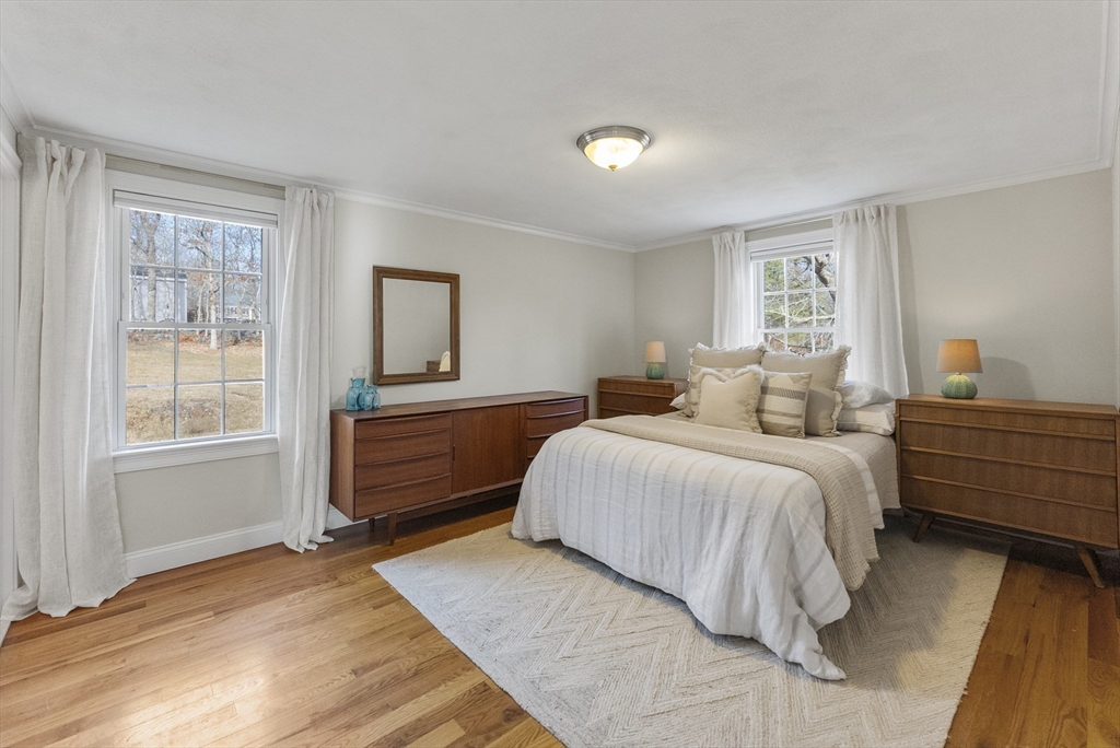 30 Pawtuxet Road Plymouth, MA 02360 - Photo 28 of 42 a bedroom with a bed and wooden floor