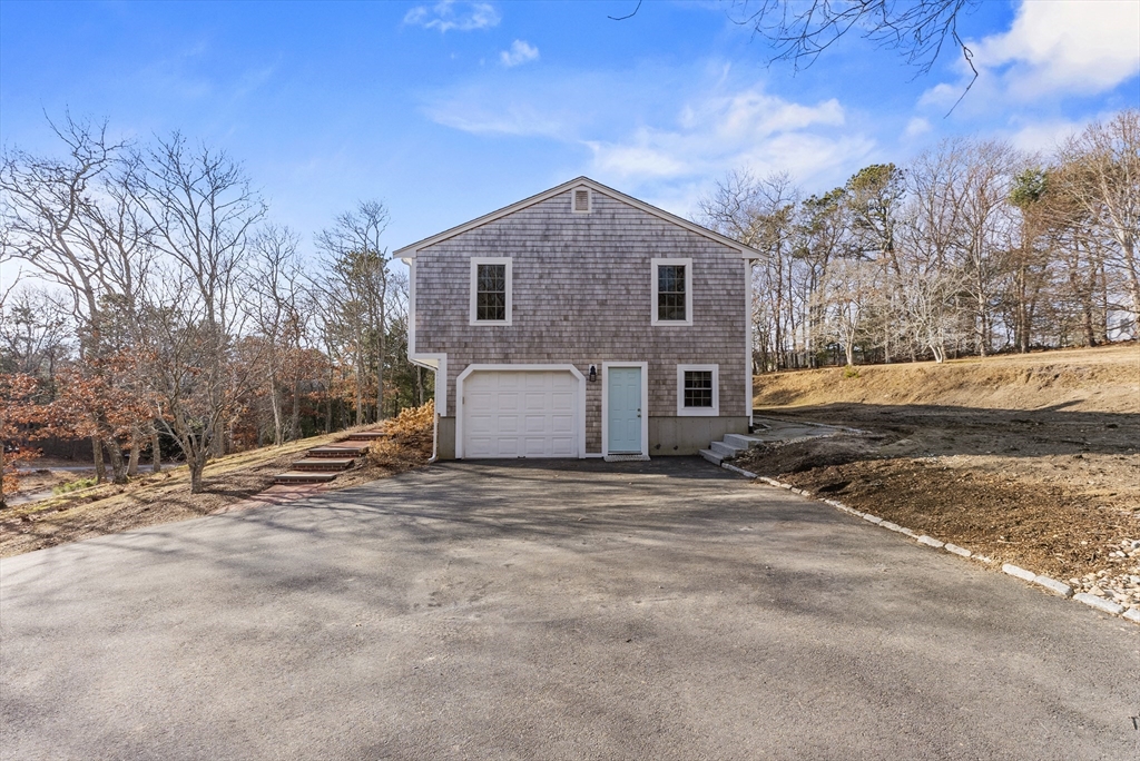 30 Pawtuxet Road Plymouth, MA 02360 - Photo 9 of 42 a view of a house with a yard