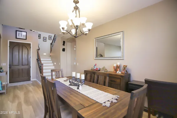 a dining room with furniture and window