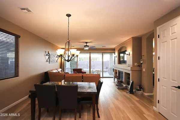 a living room with furniture fireplace and a flat screen tv