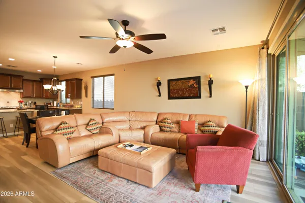 a bedroom with furniture and a window